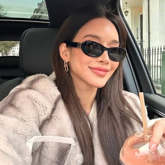 Miu Miu MU06ZS 1AB5S0 Oval Sunglasses - Black / Grey main image 9